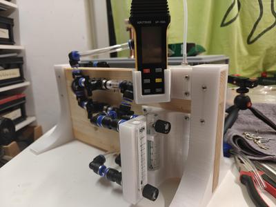 Air flow control and pressure measurement station