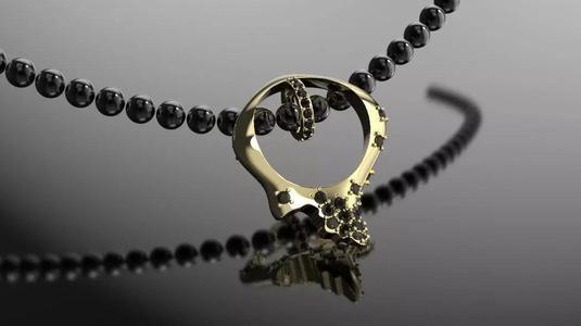 beautiful pendant of smooth shape with stones