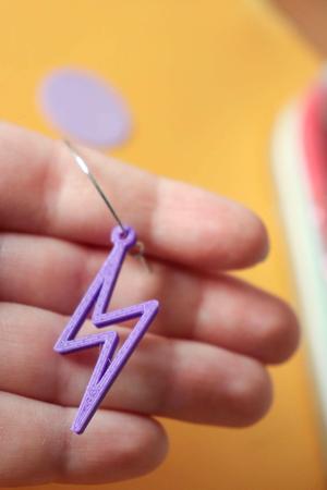 Earring with lightning bolt shape
