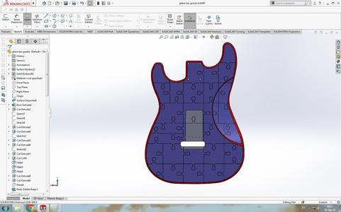 The body of the guitar is made of puzzles
