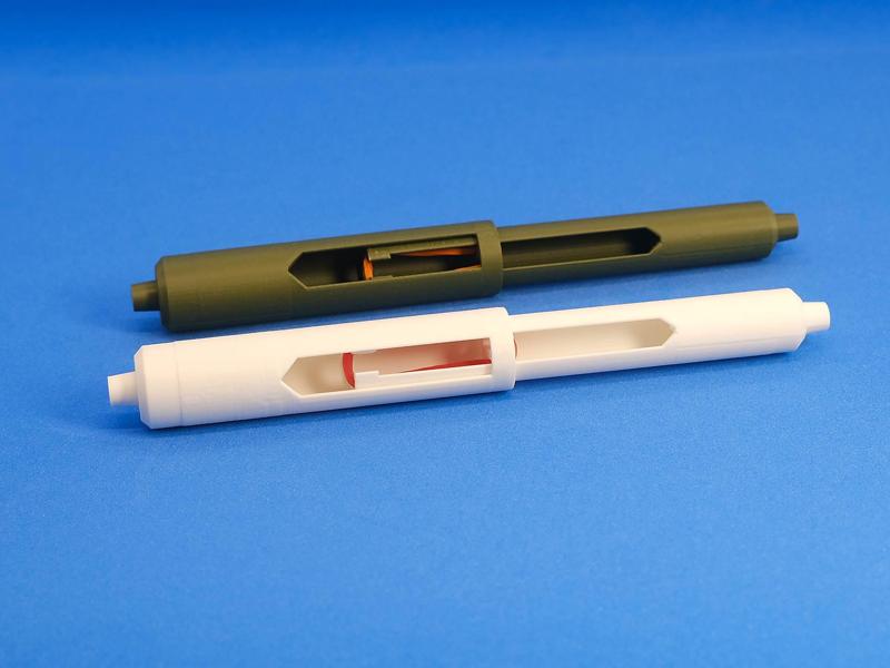 Low diameter toilet paper spindle, Rubber Band powered