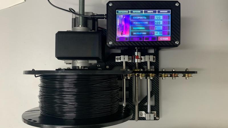 Spool winder touchscreen housing