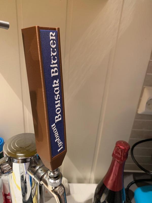 Tap handle with customizable text