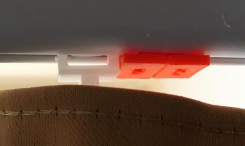 Curtain track plug for metal rails