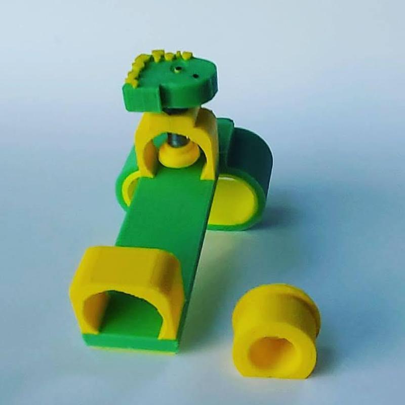 HERRAMIENTA DE ESCRITURA PARA NIÑOS CON DISCAPACIDAD MOTRIZ