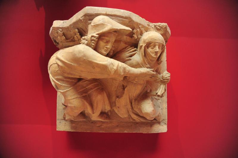 Capital representing two female figures