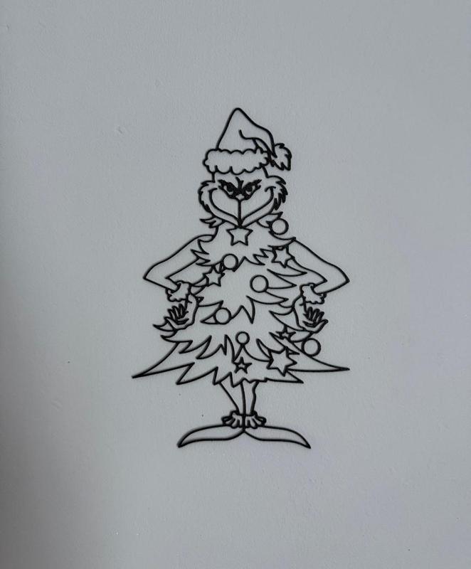 Grinch disguised as a Christmas tree