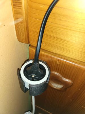 Single extension cord wall holder