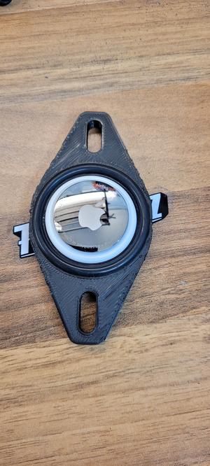 AirTag holder for bottle cage on the bike