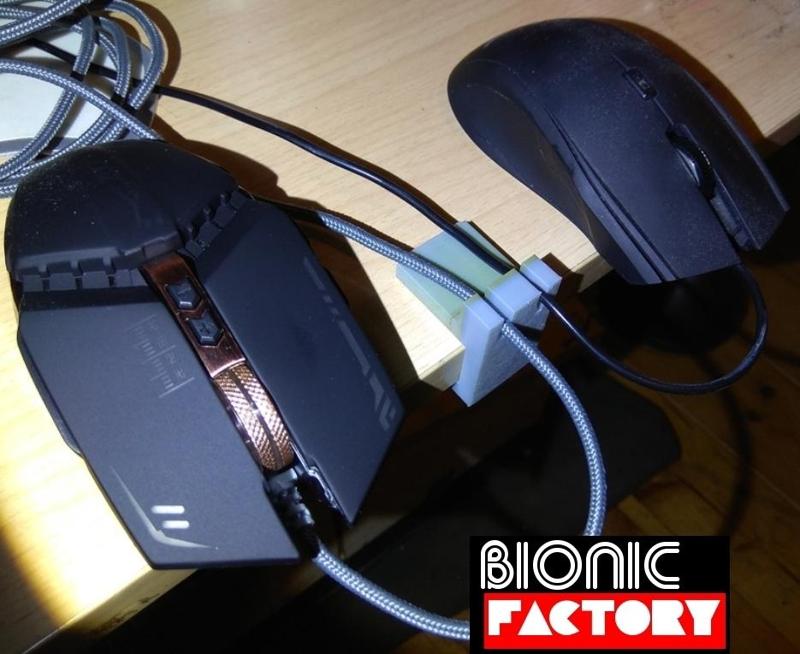 Mouse cable holder for  2 different cables