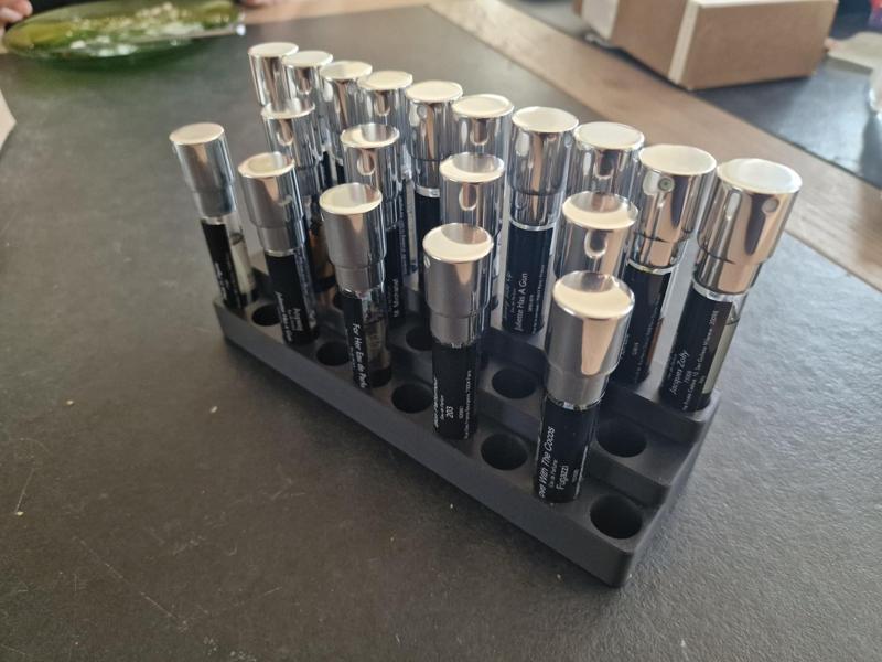 Parfumado perfume tube stand.