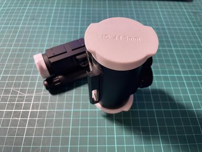 Parametric lens cap for scopes