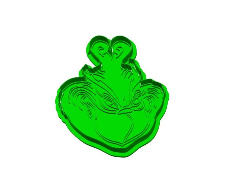 evil grin green guy cookie cutter and stamp set 2 pieces