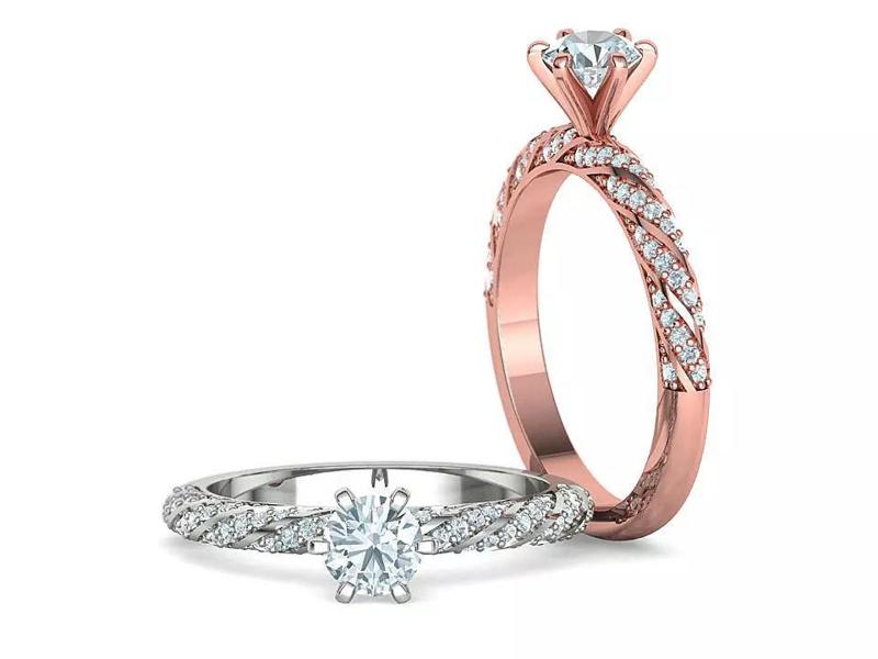Engagement ring with diamonds twisted around the band 3d model