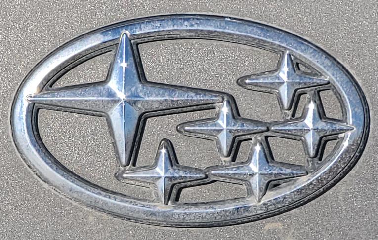 Emblem Subaru Justy Back
