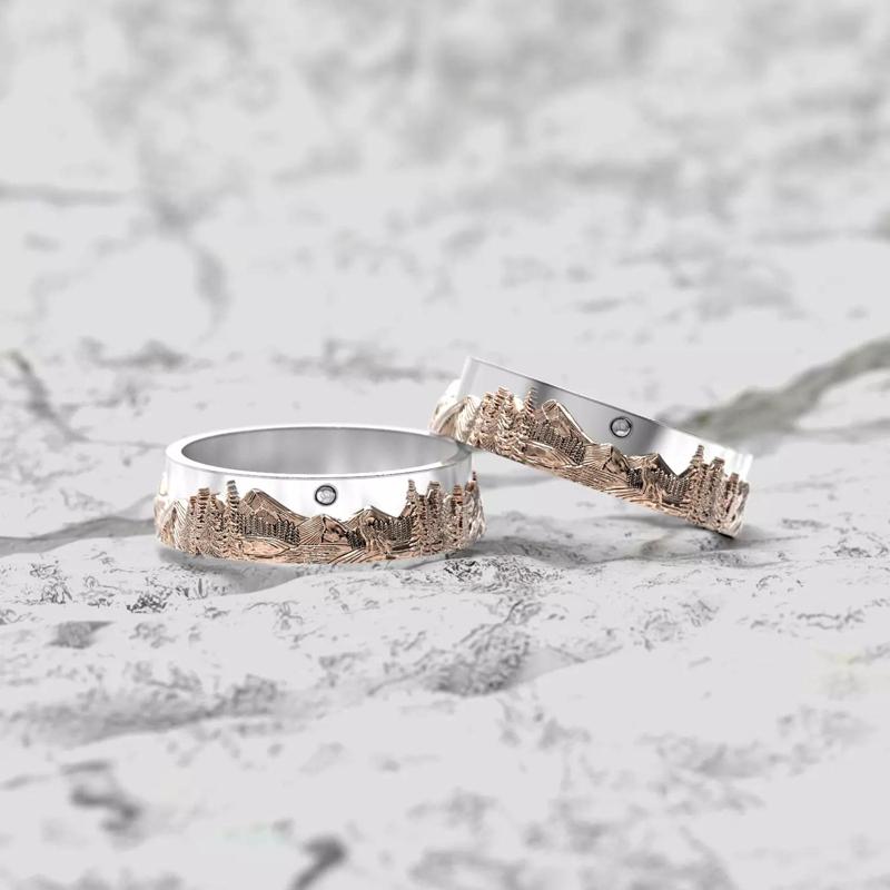 Model of wedding rings with mountains