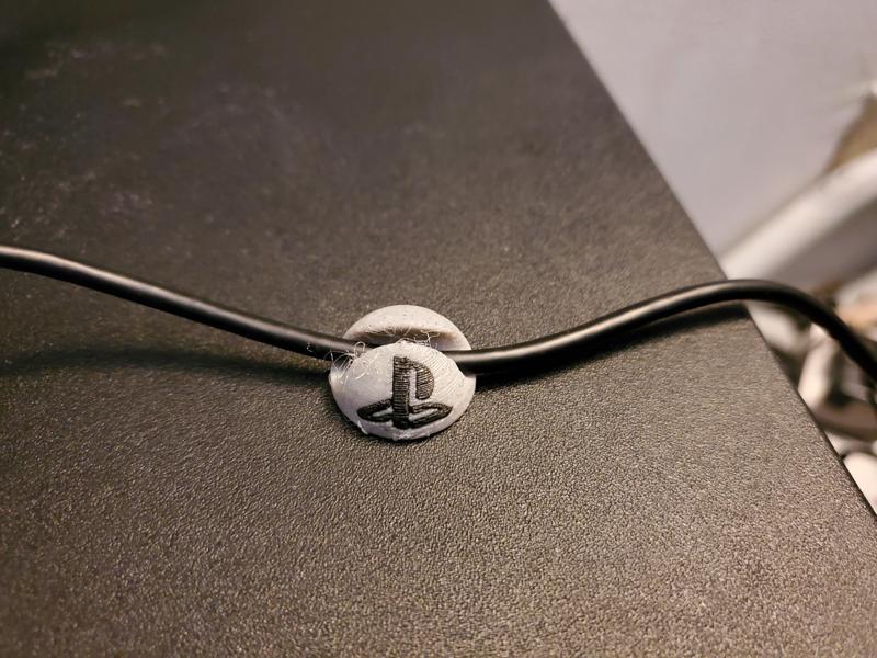 Wire holder Playstation logo