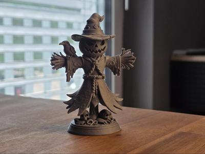 Pumpkin Scarecrow Figurine with Crow