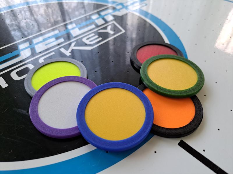 Air hockey pucks