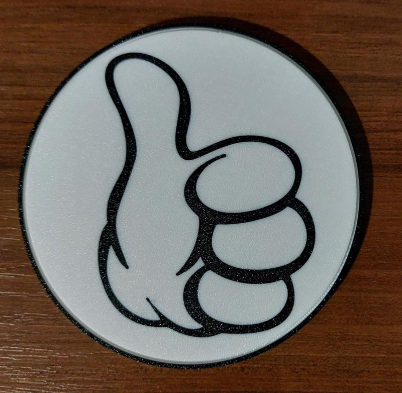 Thumb coaster