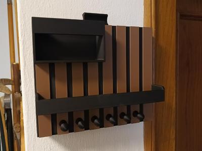 Key rack with secret compartment