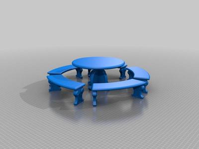 Mesa de cemento con banquitos