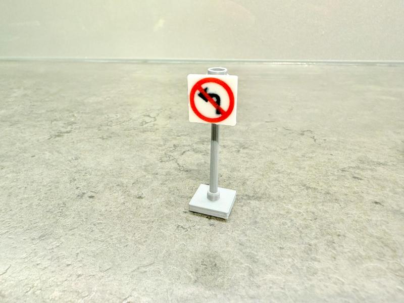 Brick road - sign no left turn