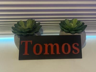 Tomos