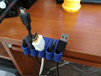 Cable holder for table