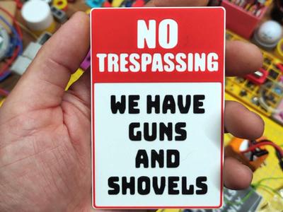 No trespassing - gun sign