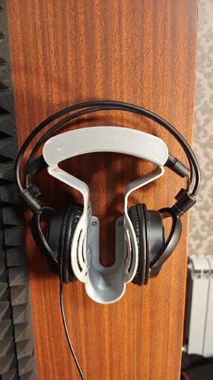 Headphones support on wall   