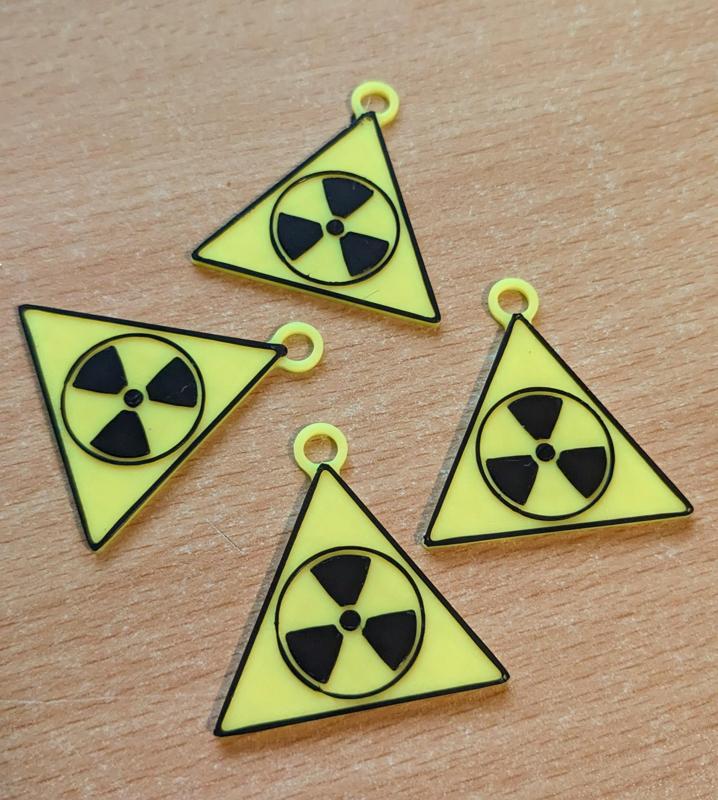 Radiation symbol keyring charm