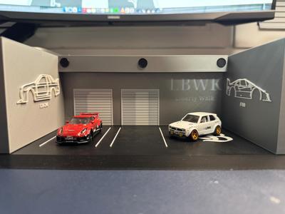 LBWK garage with models on wall 1/64 , 1:64
