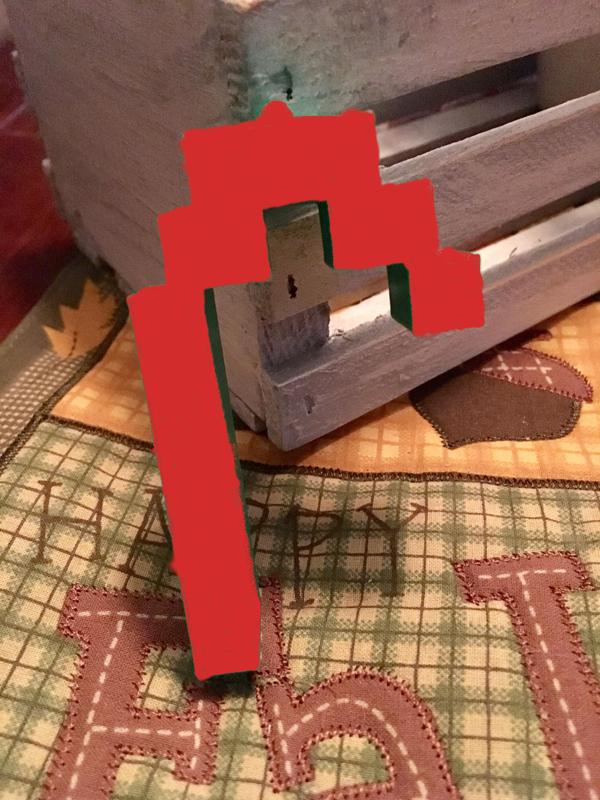 Pixelized candy cane ornament