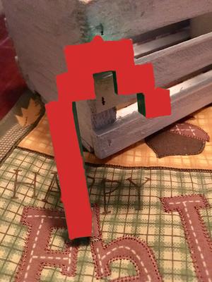 Pixelized candy cane ornament