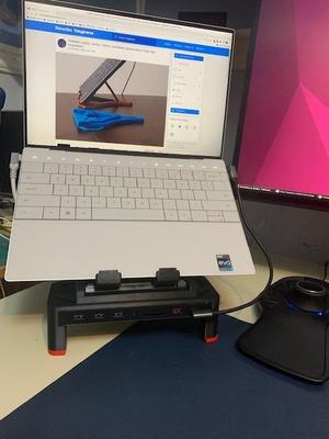 Raiser for foldable stand with optional port replicator insert