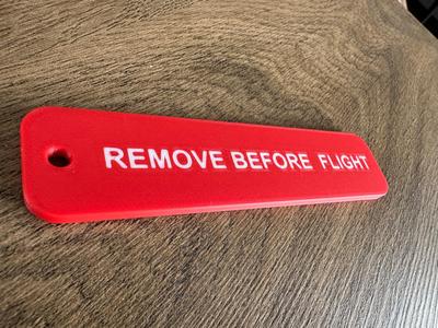 Remove before flight badge
