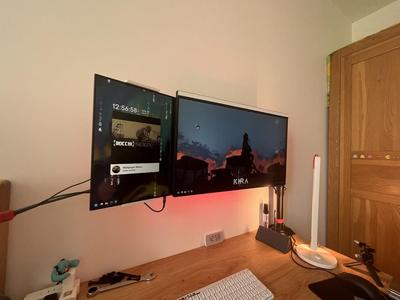 A stand for a portable monitor or a second monitor that connects to the same vesa connector
