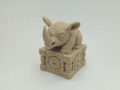 Cute Rhinoceros on an Ornate Pedestal