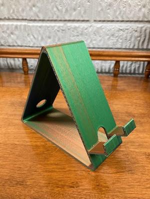 Tablet holder with access for power cord