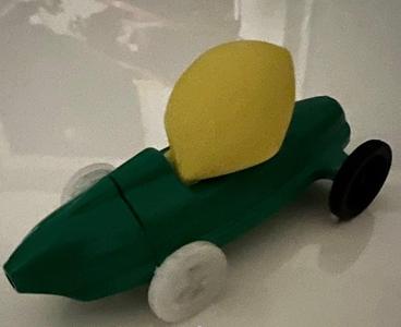 Balloon vehicle axle with wheels