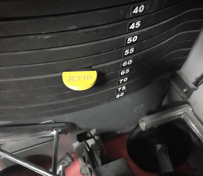 Iron foot stop for weight machine