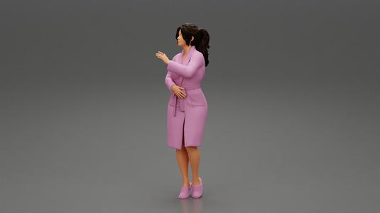 woman in bathrobe standing