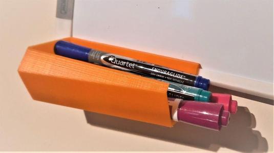 marker tray- hooks into  my whiteboard