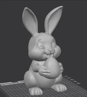 Cute Easter Bunny holding easter egg   
