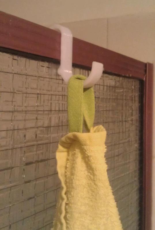Shower towel / face washer hook for glass wall or extruded edge shower recess