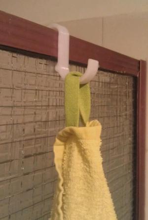 Shower towel / face washer hook for glass wall or extruded edge shower recess