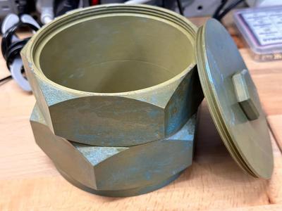 "Nutcase" — Decorative container for pens, tools, plants, etc.   