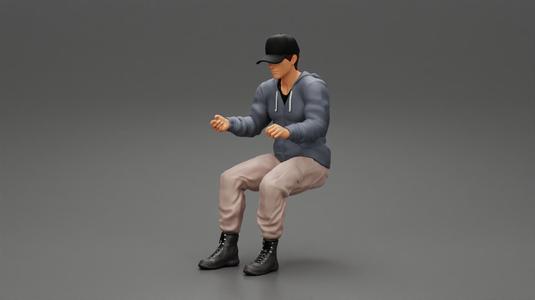 Man sitting on driver seat in car in cap