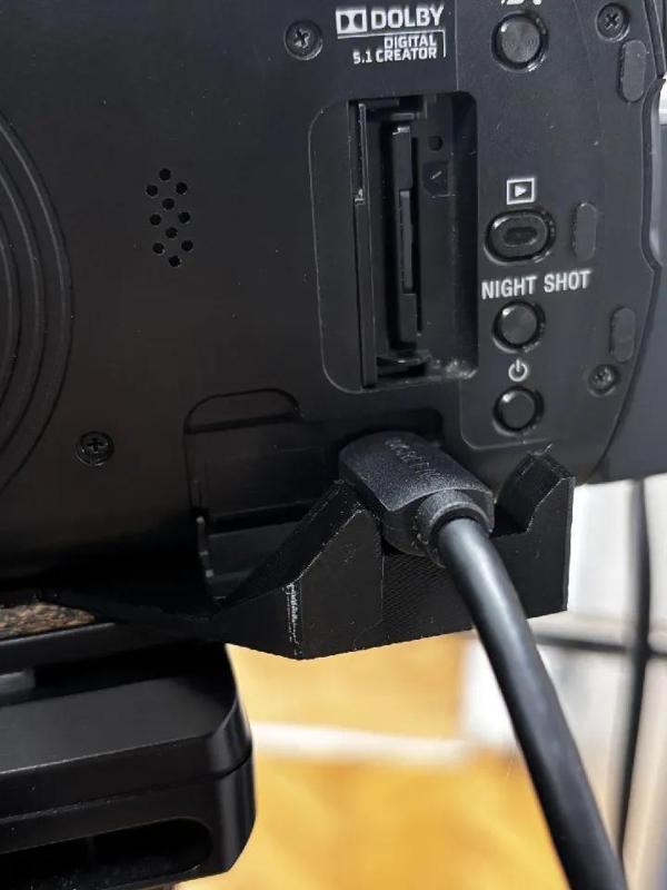 Sony AX53 HDMI cable holder   